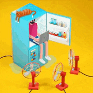 a man is sitting in a refrigerator using a laptop computer .