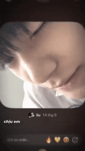 a close up of a person 's face with the name liu 14 thg 9 below it
