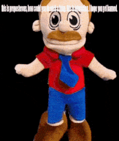 a stuffed man with a mustache wearing a tie