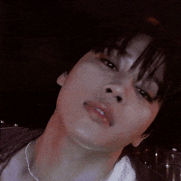 a close up of a person 's face with their mouth open