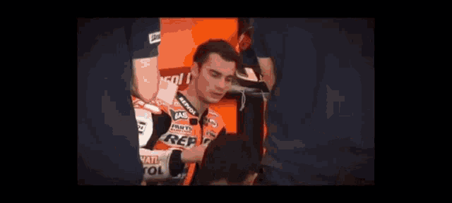 a man is riding a motorcycle on a track
