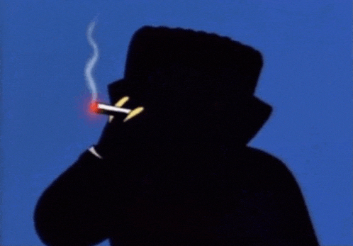 a man in a top hat is smoking a cigarette in the dark
