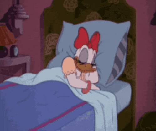 a cartoon drawing of daisy duck laying in bed