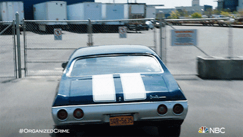 a car with a license plate that says srr 5336 is parked in a parking lot