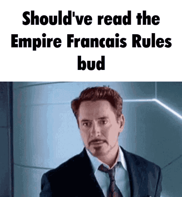 a man in a suit and tie with the words should ve read the empire francais rules bud below him