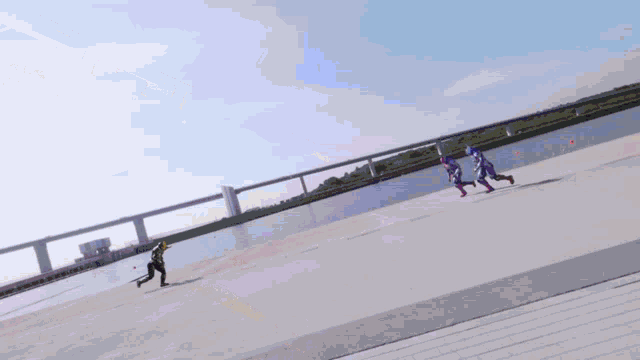 a man in a yellow helmet is fighting another man in a red and blue helmet