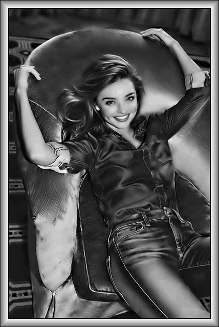 a black and white photo of a woman in a chair