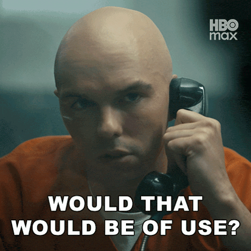 a bald man talking on a phone with the words would that would be of use