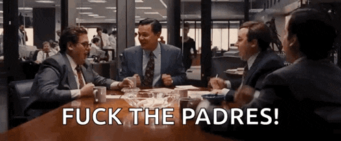 a group of men sitting around a table with the words fuck the padres