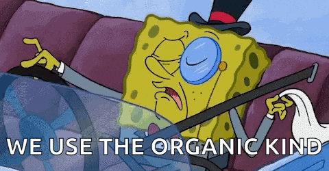 spongebob wearing a top hat and glasses is driving a car and says `` we use the organic kind '' .