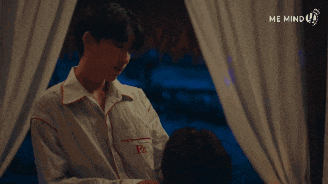 a man in a white shirt with the letters rz on the front