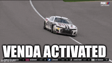 a race car on a race track with the words venda activated