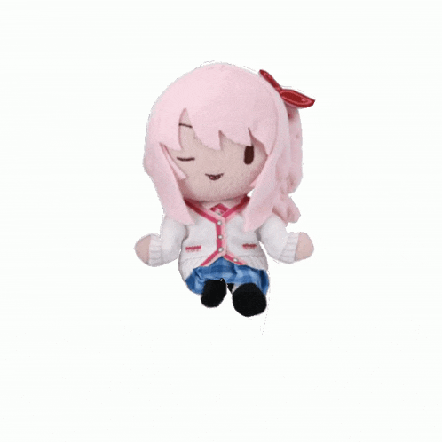 a stuffed doll of a girl with pink hair is sitting on a white background