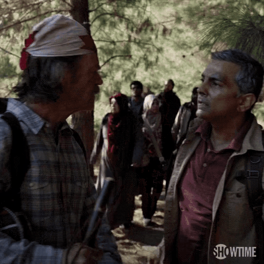 a showtime logo can be seen in the background of a scene