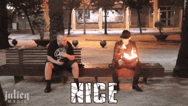 two men are sitting on a bench with the word nice written on the bottom