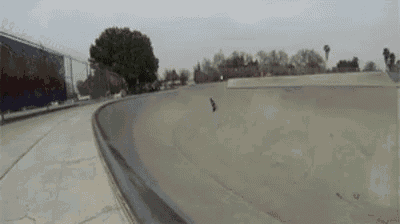 a person is doing a trick on a skateboard in a skate park .