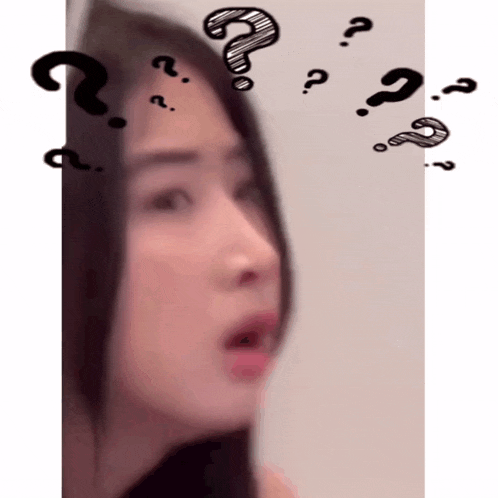 a woman 's face is surrounded by question marks