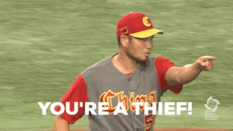 a baseball player with the name chen on his jersey is standing on a field .