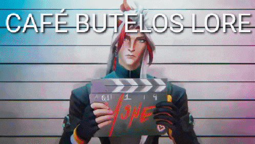 a man is holding a clapper board with the word love on it