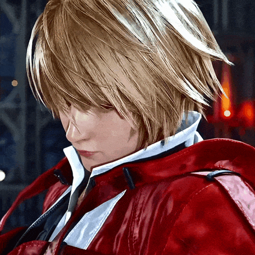 a close up of a person 's face with blonde hair and a red jacket