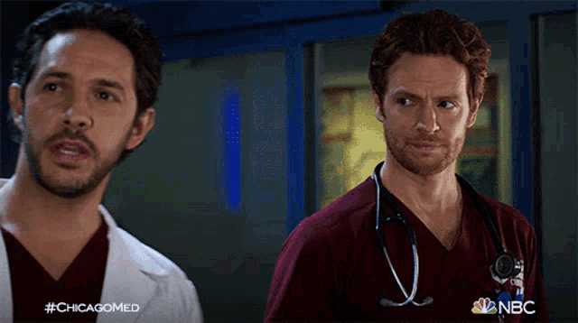 two doctors are standing next to each other and the hashtag #chicagomed is on the bottom