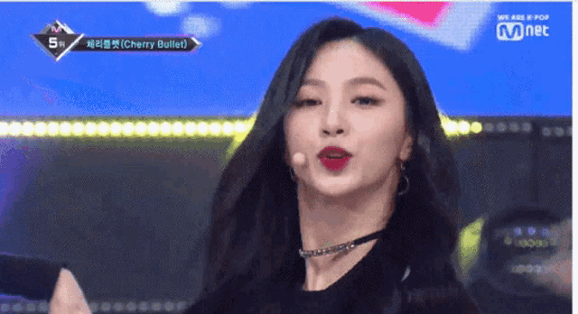 a woman with cherry bullet written on the bottom