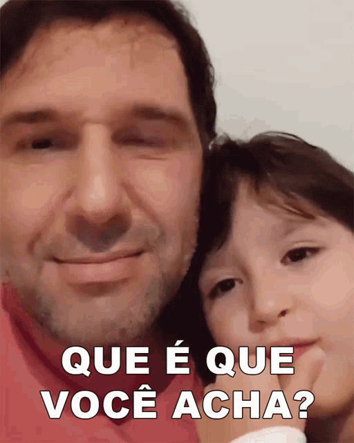 a man and a little girl with the words que e que voce acha