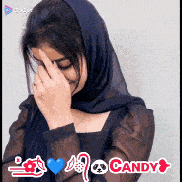 a woman covering her face with her hand and a candy logo in the corner