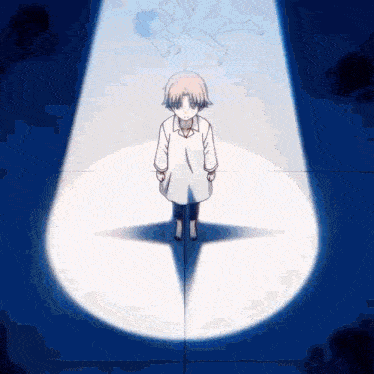 a little girl is standing in a spotlight with a shadow of a person on the wall behind her .