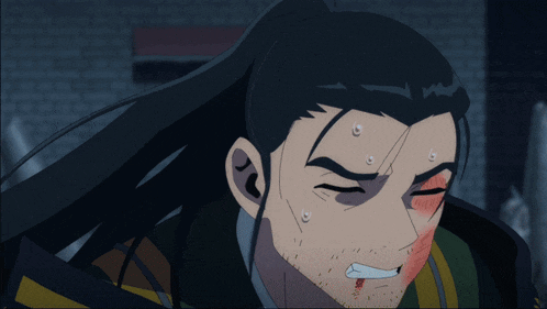 a man with long hair and a beard has a bloody face