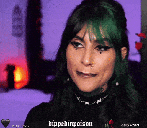 a woman with green hair and a choker that says dipped in poison