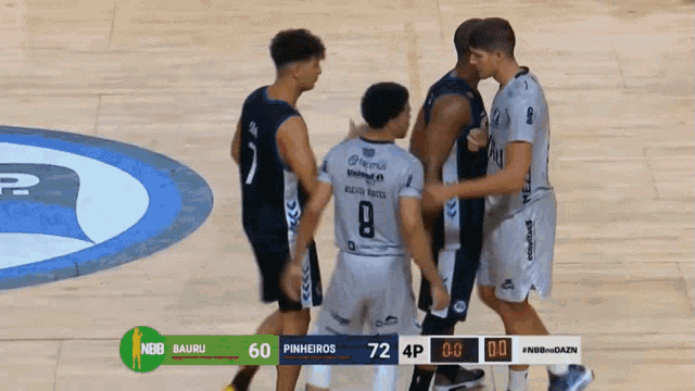 a basketball game is being played between bauru and pinheiro