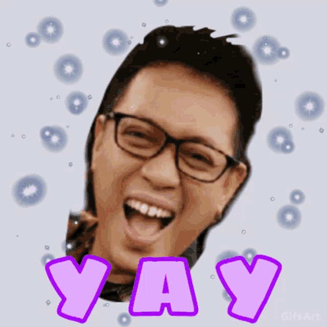 a gif of a man laughing with the word yay above him