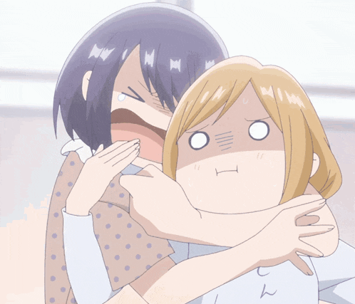 two anime girls are hugging each other with one making a face