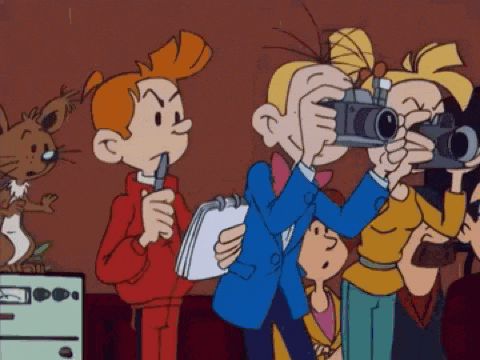 a group of cartoon characters are taking pictures with a camera