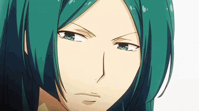 a close up of a person with green hair and blue eyes