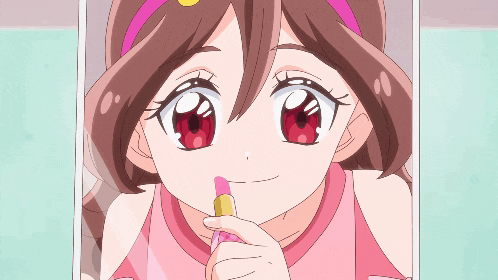 a girl in a pink shirt is holding a pink lipstick