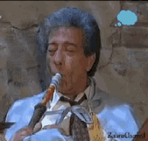 a man is smoking a hookah and has a thought bubble above his head