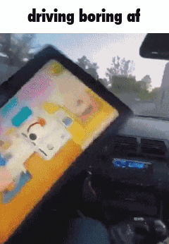 a picture of a tablet in a car with the words driving boring af