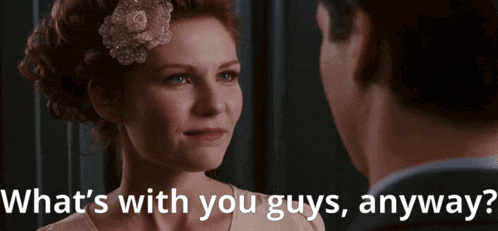 a woman with a flower in her hair looks at a man with the words " what 's with you guys anyway "