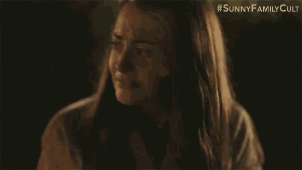 a close up of a woman 's face with the words `` sunny family cult '' on the bottom .