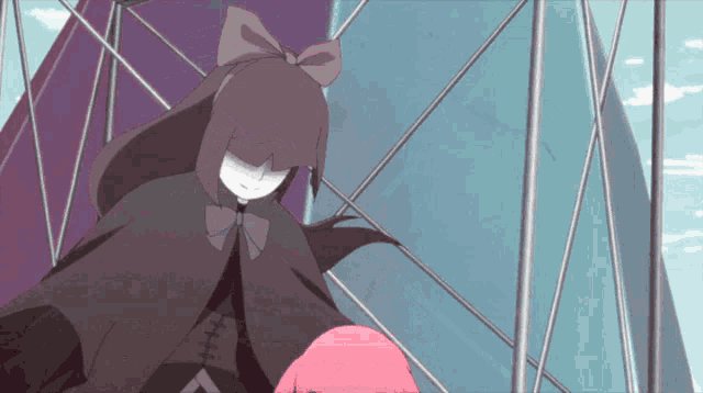 a girl with a black cape and a bow on her head
