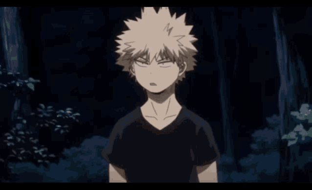 katsuki bakugo from my hero academia is making a funny face while standing in the dark .