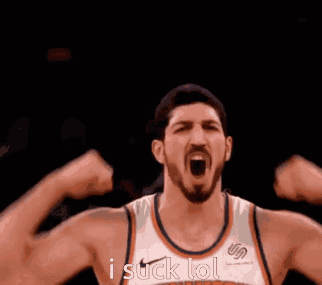 a basketball player flexing his muscles and saying i suck lol