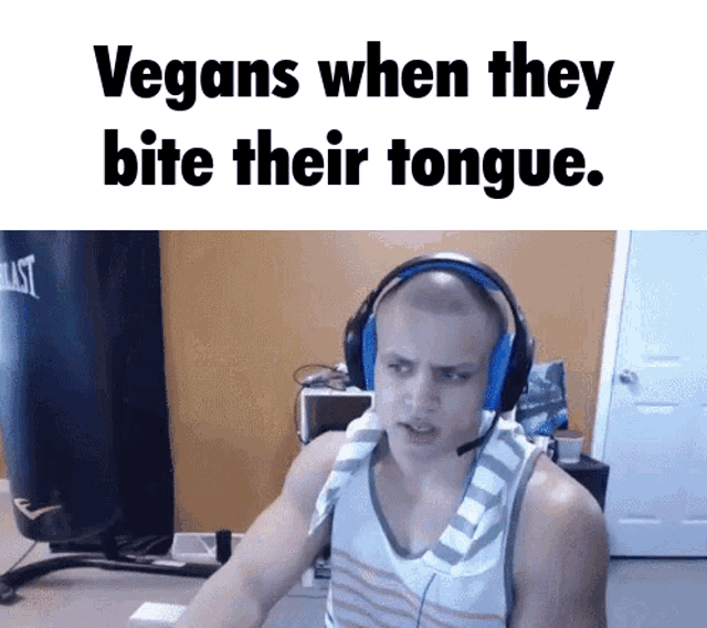 a man wearing headphones with the words vegans when they bite their tongue