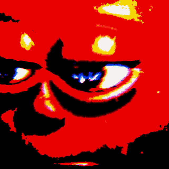 a close up of a person 's face with a red and yellow background