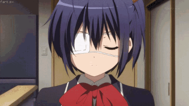 a girl with a bandage on her eye and tokyo mx written in the corner