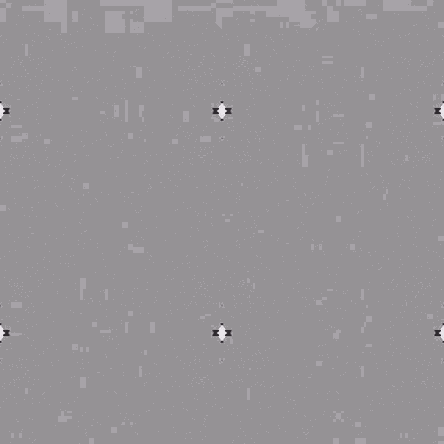 it looks like a kaleidoscope with a gray and white pattern