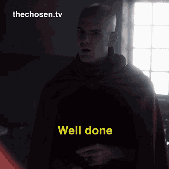 a man in a red cape says well done in yellow