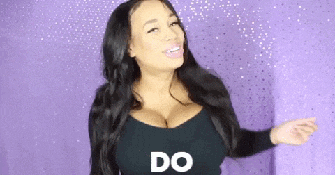a woman with large breasts is standing in front of a purple background and says do .